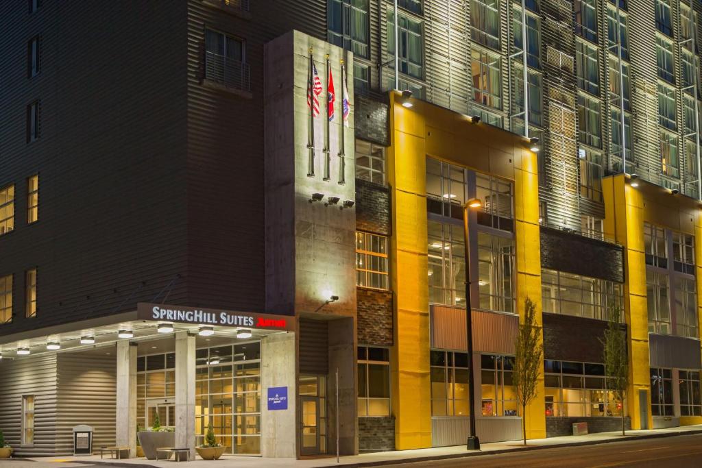 a large building with a sign in front of it at SpringHill Suites by Marriott Nashville Vanderbilt/West End in Nashville