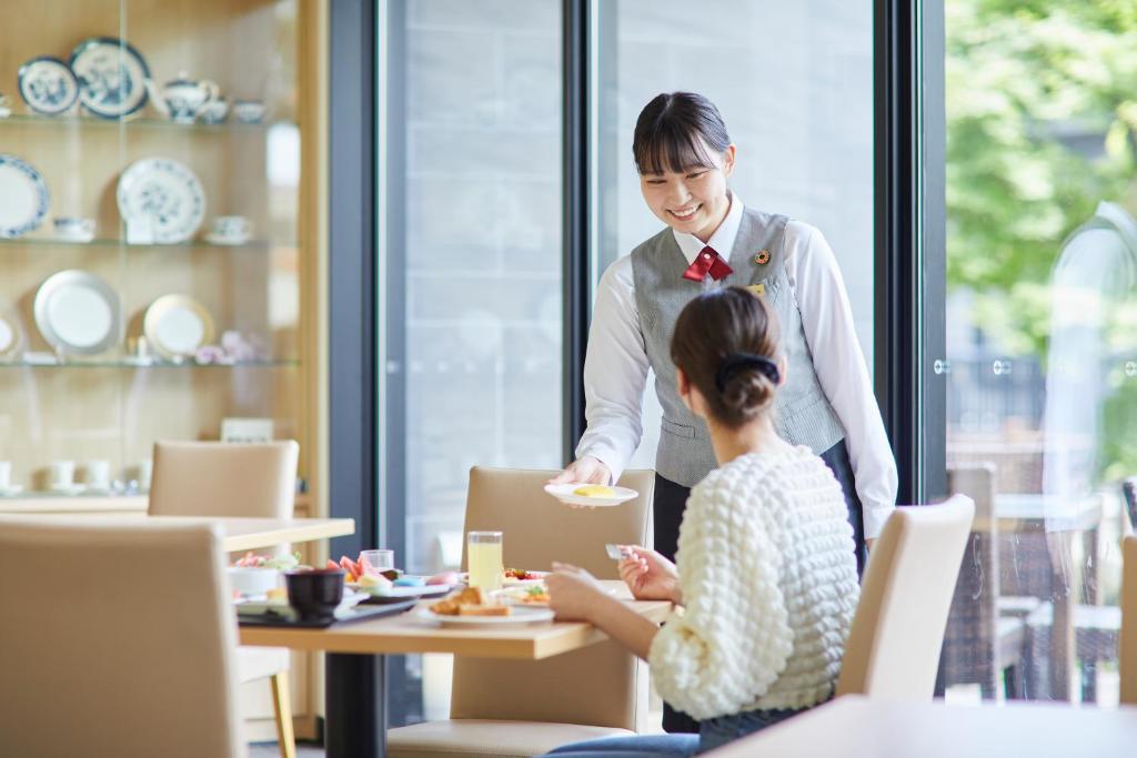 Hóspedes ficando em Kanazawa Sainoniwa Hotel