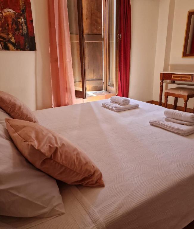 Letto o letti in una camera di Villa Penelope