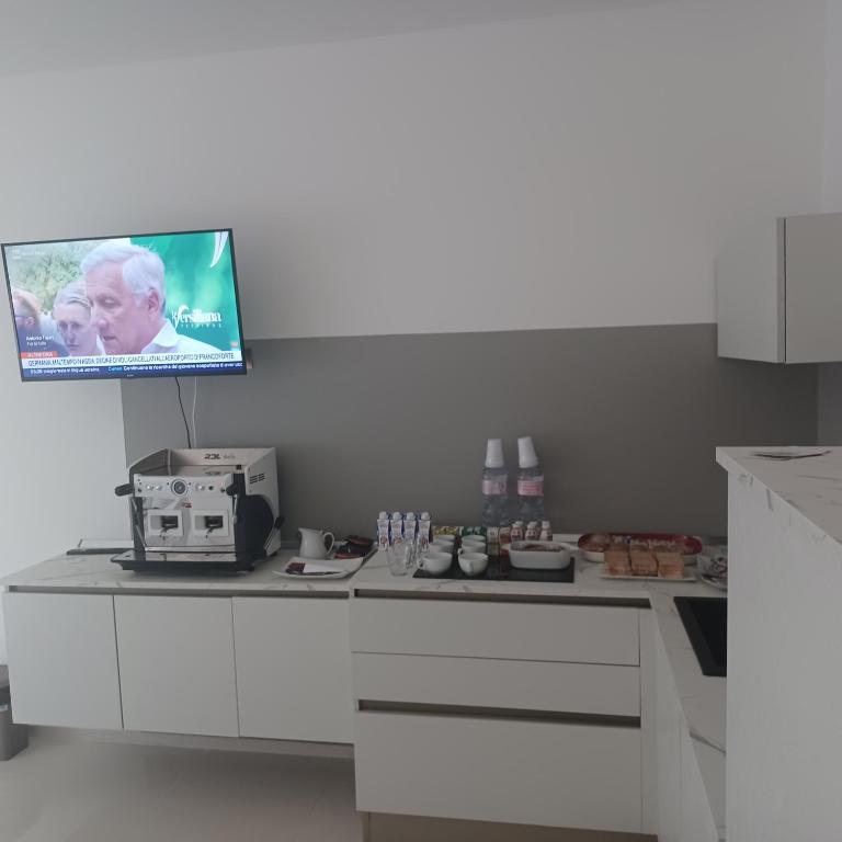Kuchyň nebo kuchyňský kout v ubytování B&B Le perle fg