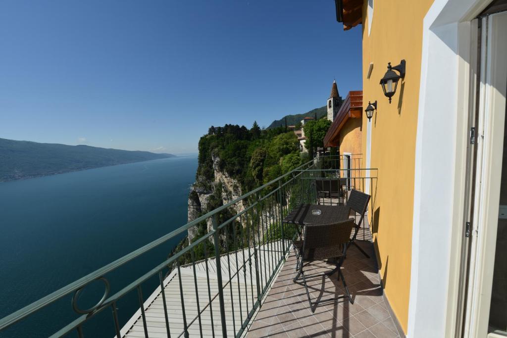 a balcony with a view of a body of water at Hotel Miralago in Tremosine Sul Garda