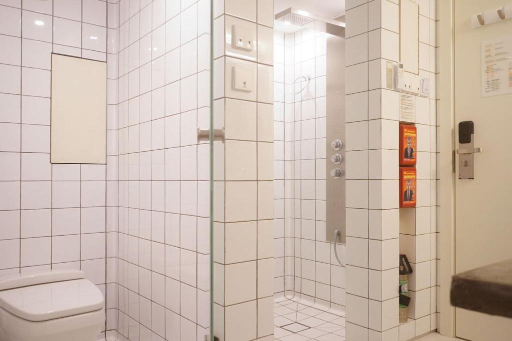 Koupelna v ubytování TGS Studio Hotel