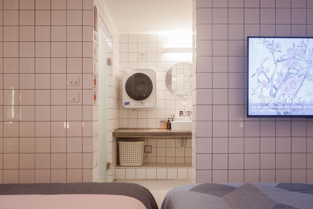 Postel nebo postele na pokoji v ubytování TGS Studio Hotel
