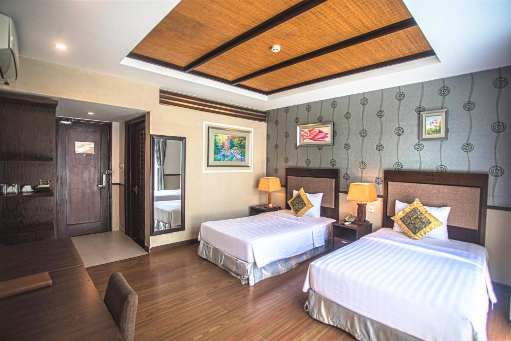 Phòng Deluxe 2 Giường Đơn Nhìn ra Một góc Biển