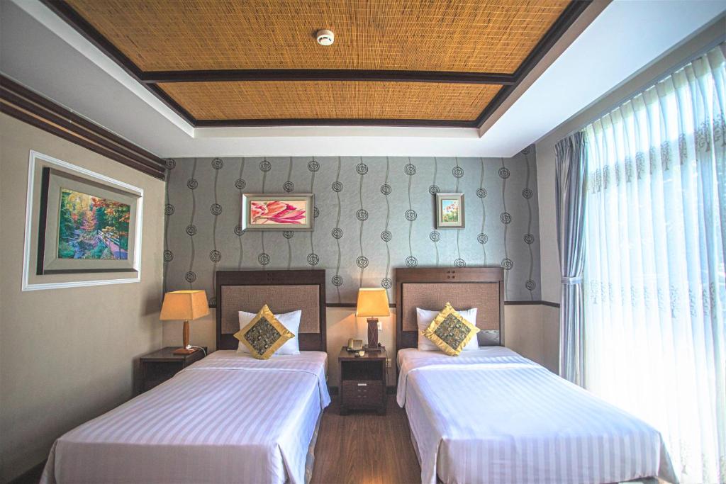 Phòng Deluxe 2 Giường Đơn Nhìn ra Một góc Biển