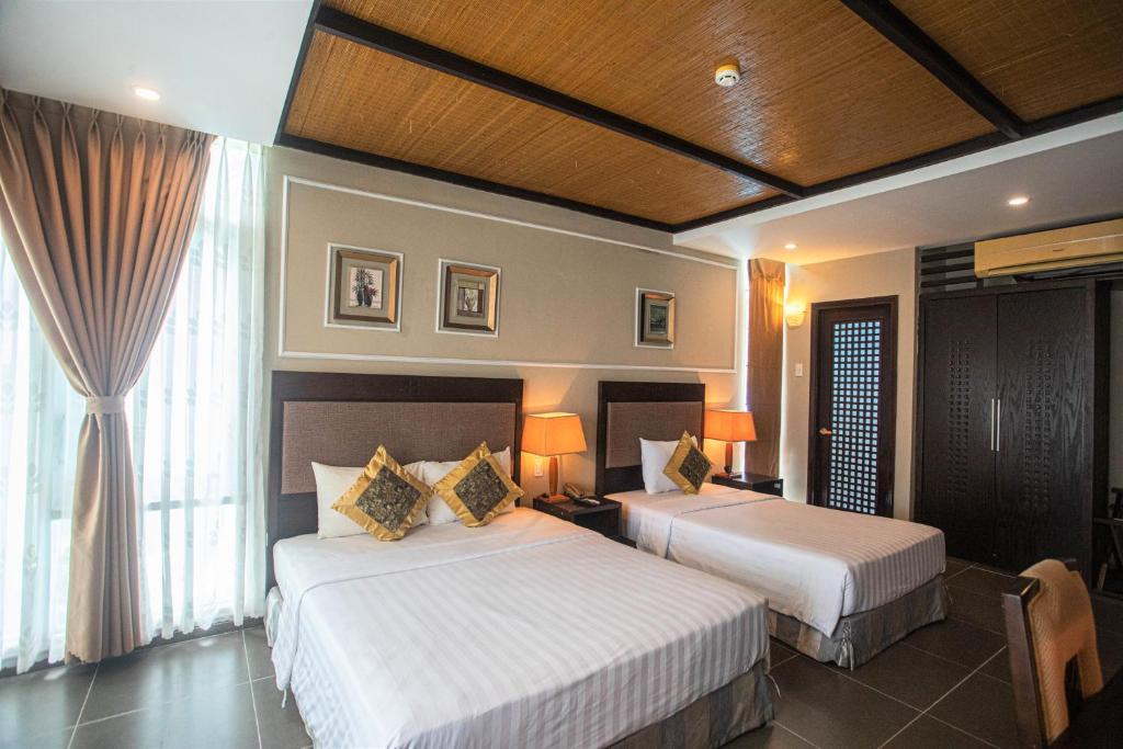 Phòng Premium Deluxe 2 Giường Đơn Nhìn ra Khu vườn