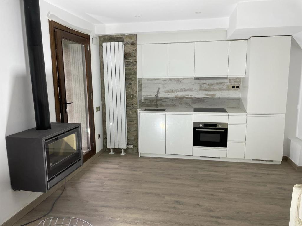 Kuchyň nebo kuchyňský kout v ubytování CASA CON ENCANTO ESTERRI