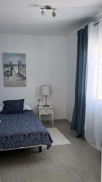 A bed or beds in a room at Villa Magnolia