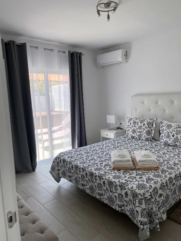 A bed or beds in a room at Villa Magnolia