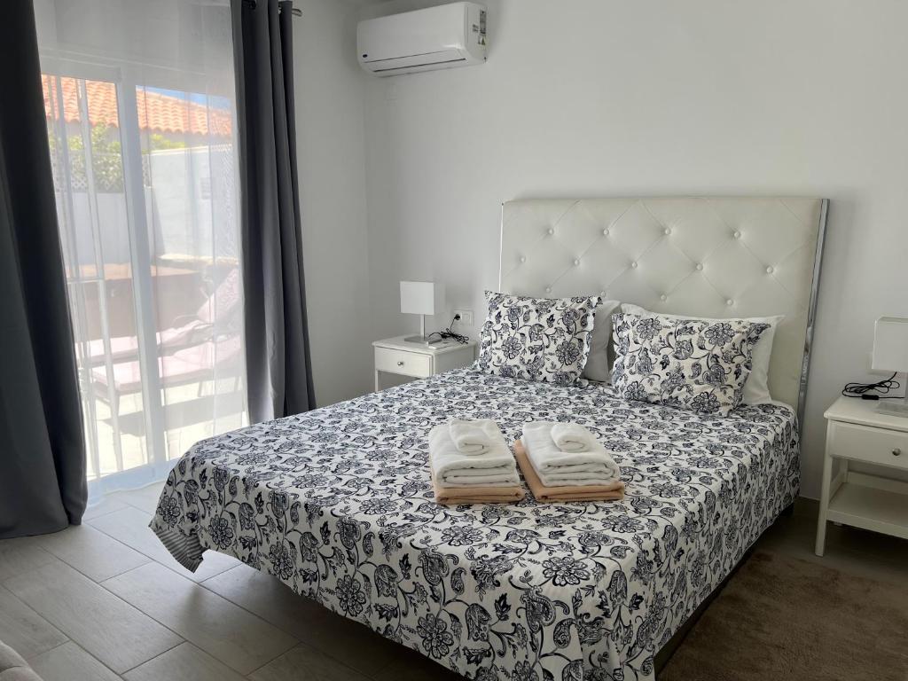 A bed or beds in a room at Villa Magnolia