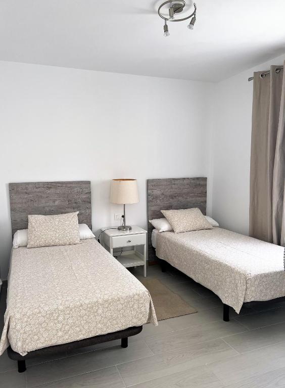 A bed or beds in a room at Villa Magnolia