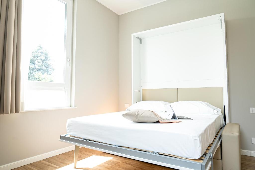 Letto o letti in una camera di Villa Tosati