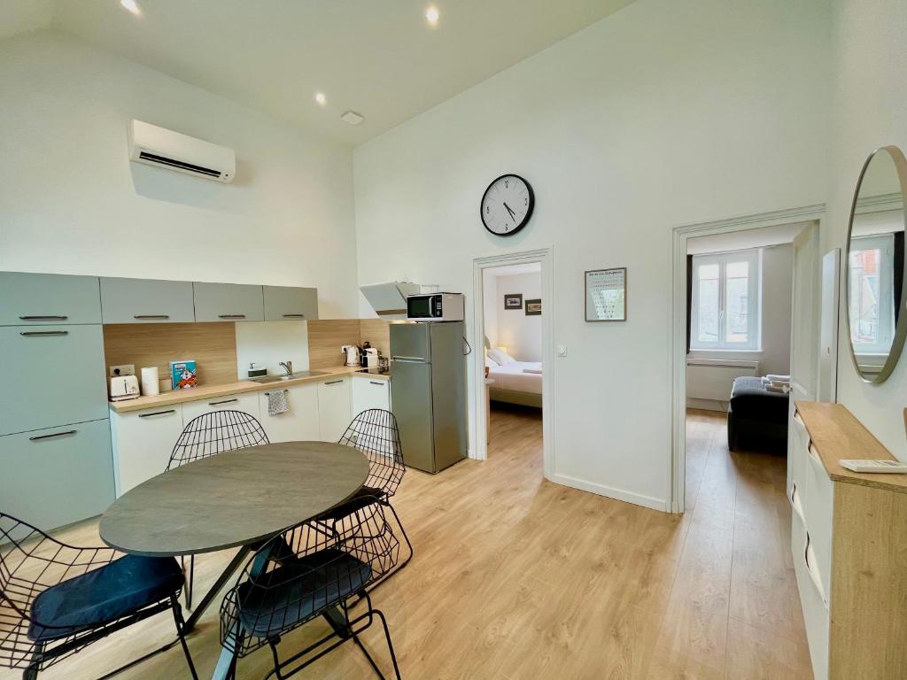 Køkken eller tekøkken på Suite Clovis 7