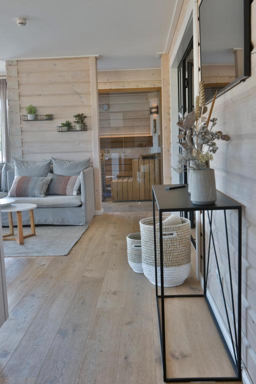 Posezení v ubytování Frei wie der Wind-Chalets