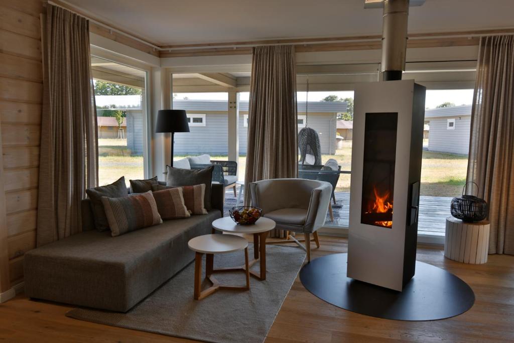 Posezení v ubytování Frei wie der Wind-Chalets