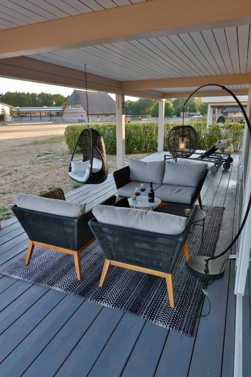 Balkón nebo terasa v ubytování Frei wie der Wind-Chalets