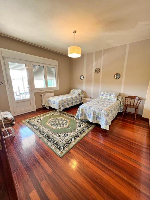 A bed or beds in a room at Casa Lola