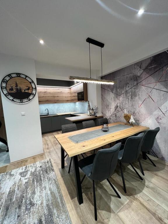 A kitchen or kitchenette at LUX apartmany Romantika CHOPOK 7, 19