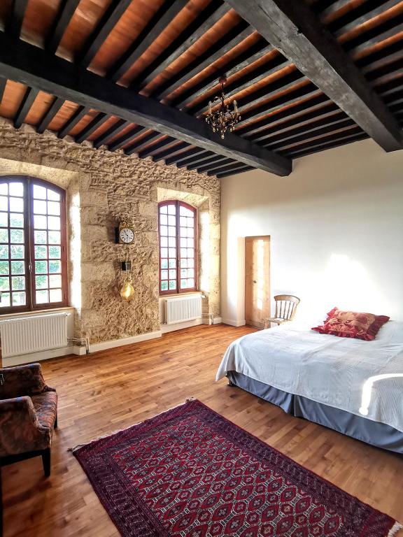 Postel nebo postele na pokoji v ubytování Château d'Esplavis