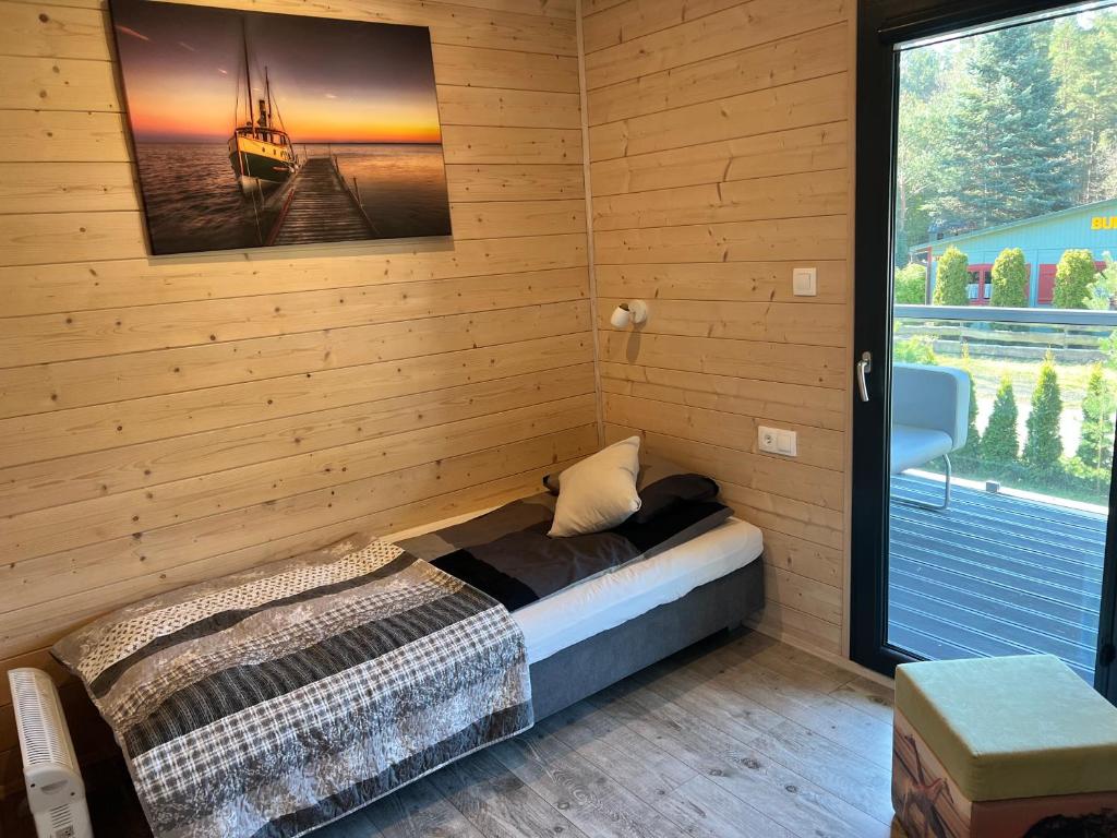 Postel nebo postele na pokoji v ubytování Domki Albertówka - Strefa Relaksu