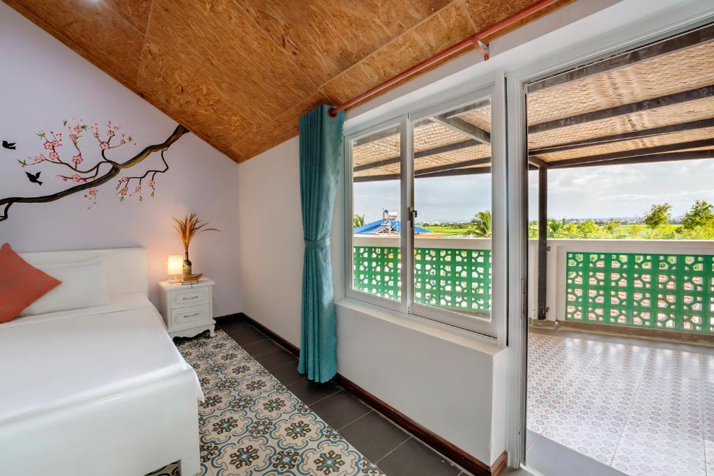 Giường trong phòng chung tại La Casa Tra Que