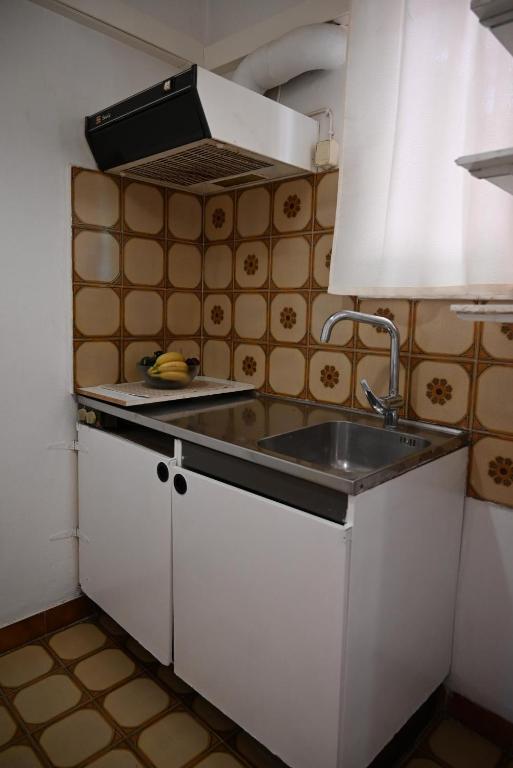 Kuchyň nebo kuchyňský kout v ubytování Helena Apartments in Paradisi