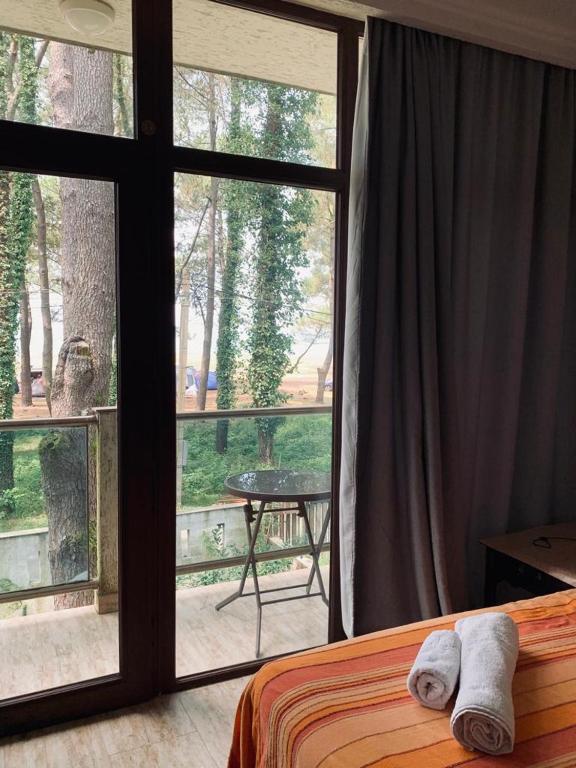 Postel nebo postele na pokoji v ubytování kaprovani Kako