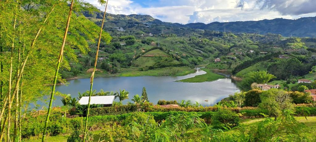 a view of a river in a valley at Finca Buena Vista in Guatapé