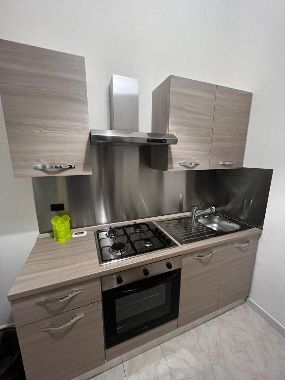 Kuchyň nebo kuchyňský kout v ubytování Porta Grazia