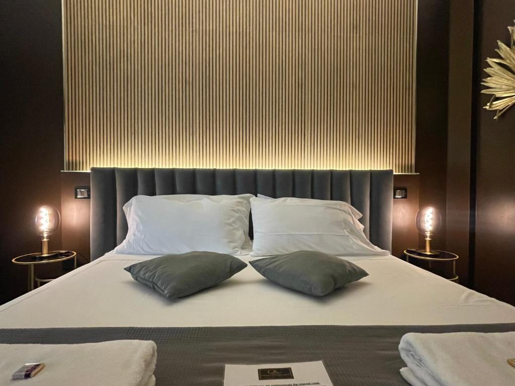 Ένα ή περισσότερα κρεβάτια σε δωμάτιο στο Pompeii Central Home