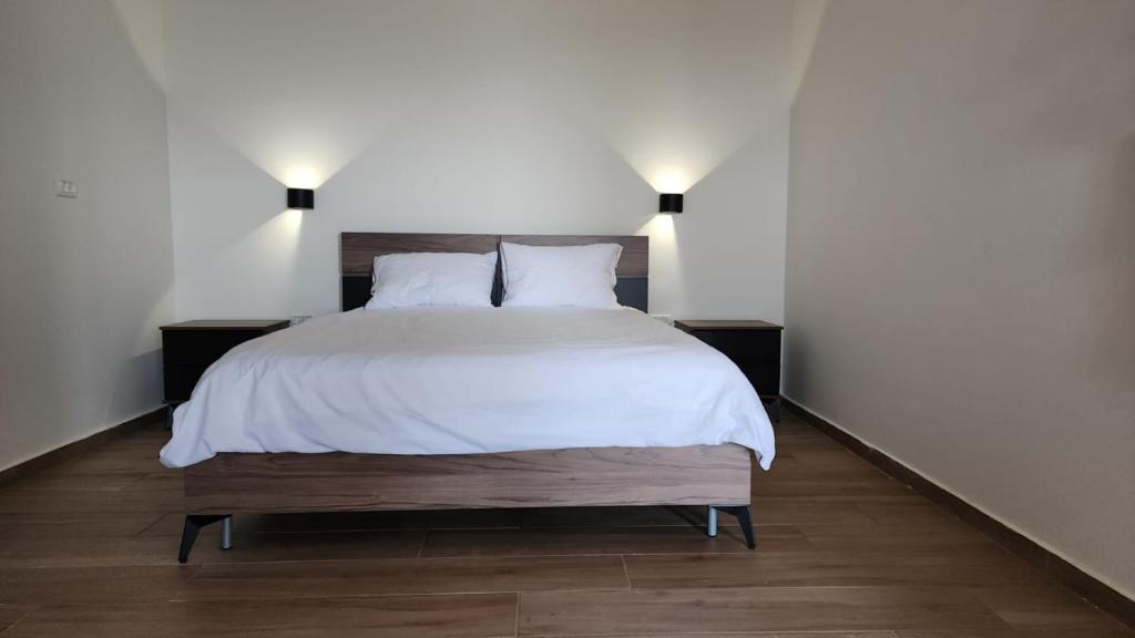 Postel nebo postele na pokoji v ubytování Har-Adir B&B