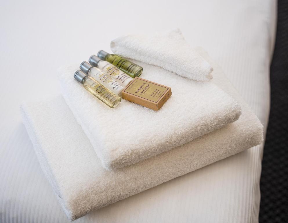 a couple of rings sitting on top of towels at Hilton Garden Inn Birmingham Brindley Place in Birmingham