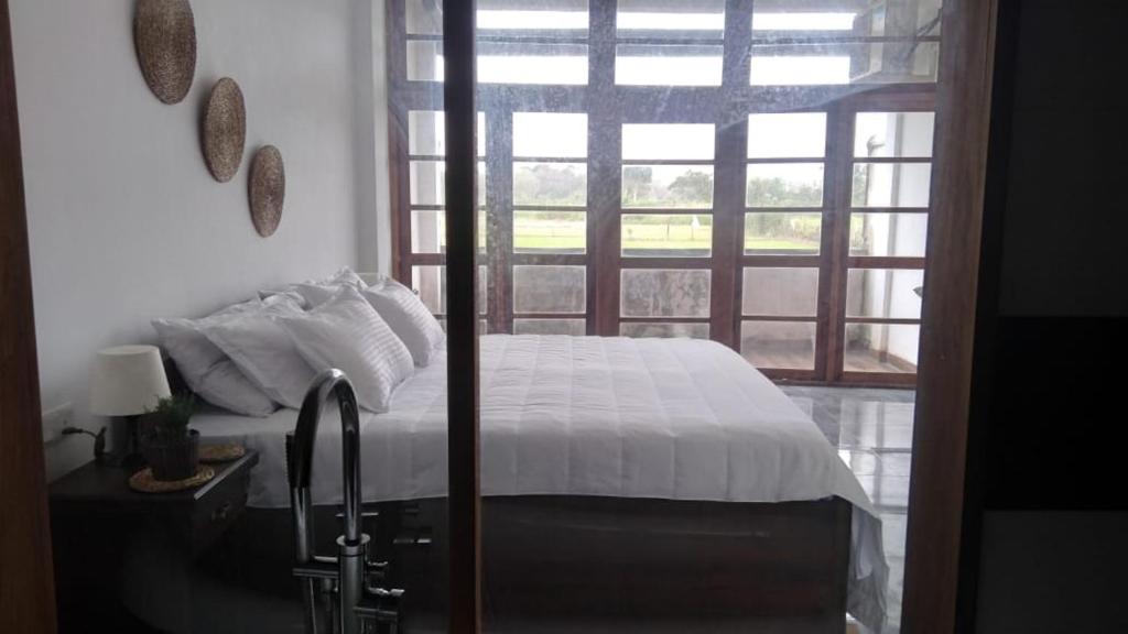 Postel nebo postele na pokoji v ubytování WILD FORTRESS HOTEL Sigiriya