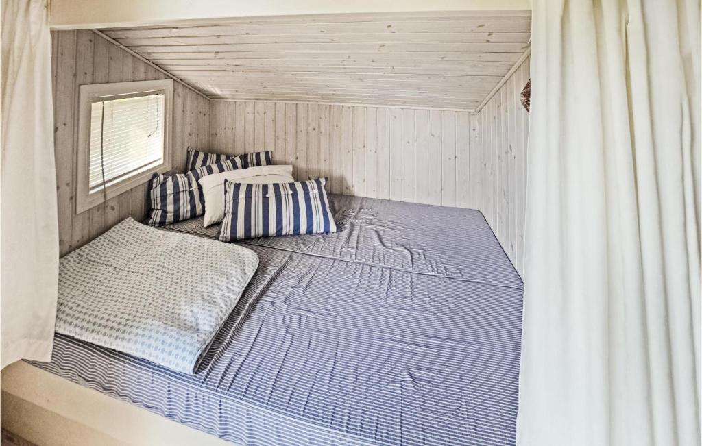Postel nebo postele na pokoji v ubytování Holiday Home Otterup With Sauna 303