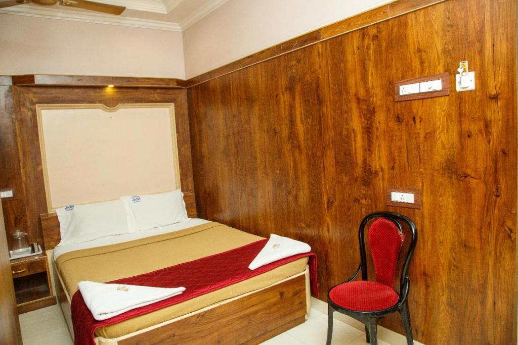 Postel nebo postele na pokoji v ubytování JJs PARK INN