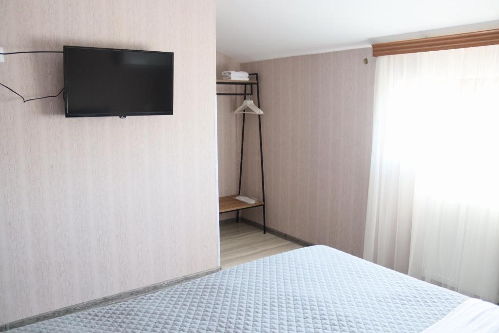 TV a/nebo společenská místnost v ubytování Hotel West Face