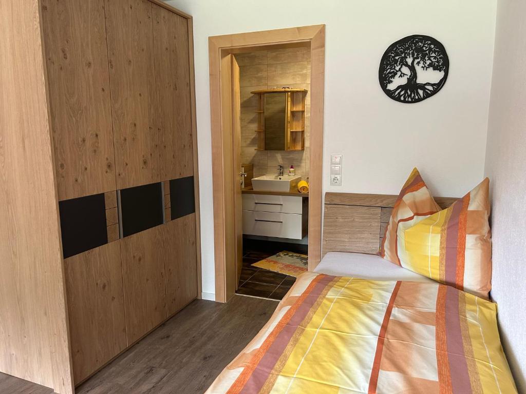 Postel nebo postele na pokoji v ubytování Häringer Mühle