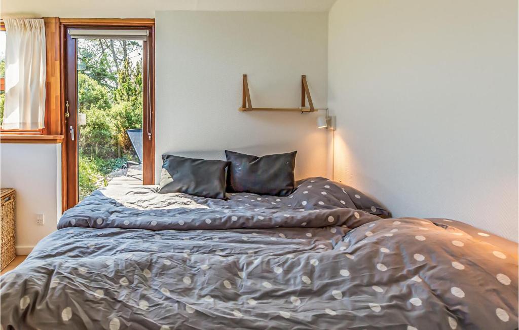 Postel nebo postele na pokoji v ubytování Two-Bedroom Holiday Home In Farevejle