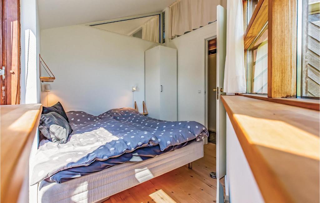 Postel nebo postele na pokoji v ubytování Two-Bedroom Holiday Home In Farevejle