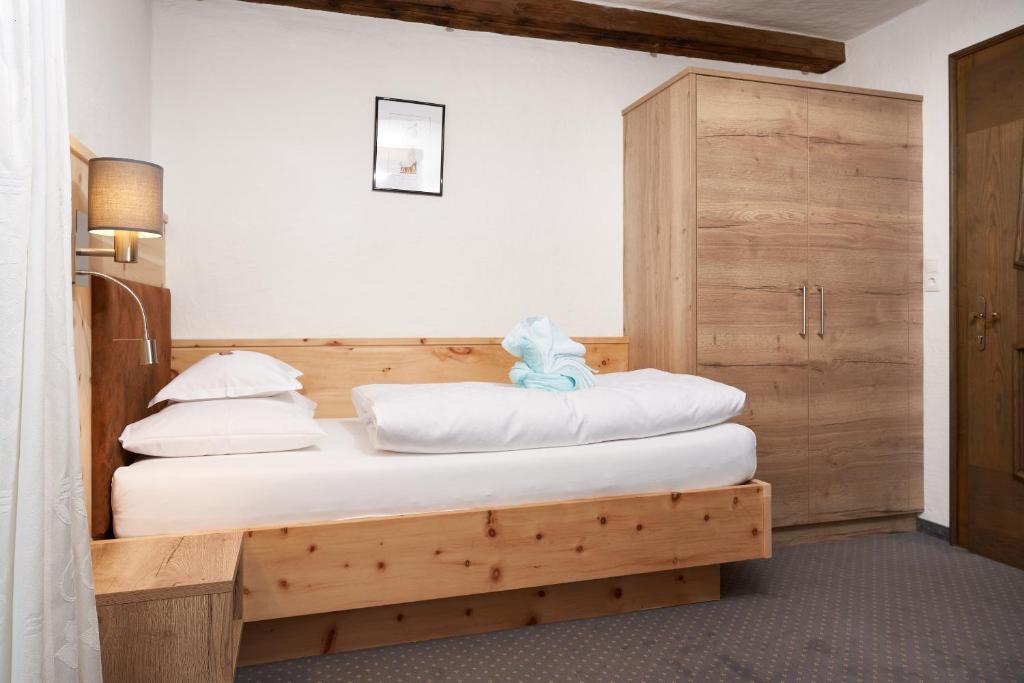 Postel nebo postele na pokoji v ubytování Hotel am Hof