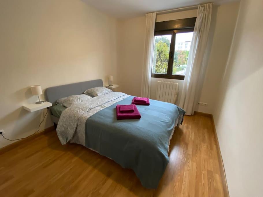 Кровать или кровати в номере Apartment close to the historical center