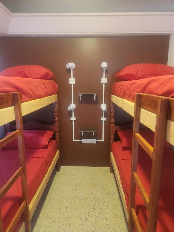 Postel nebo postele na pokoji v ubytování Pachá Hostel Backpack