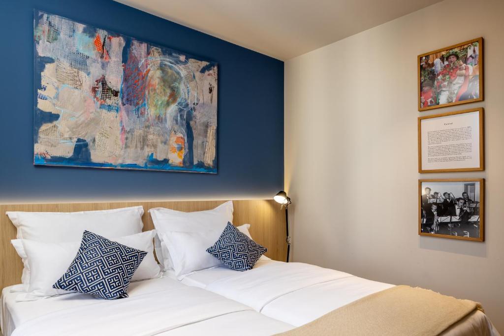 Postel nebo postele na pokoji v ubytování Emotheo Heritage Hotel