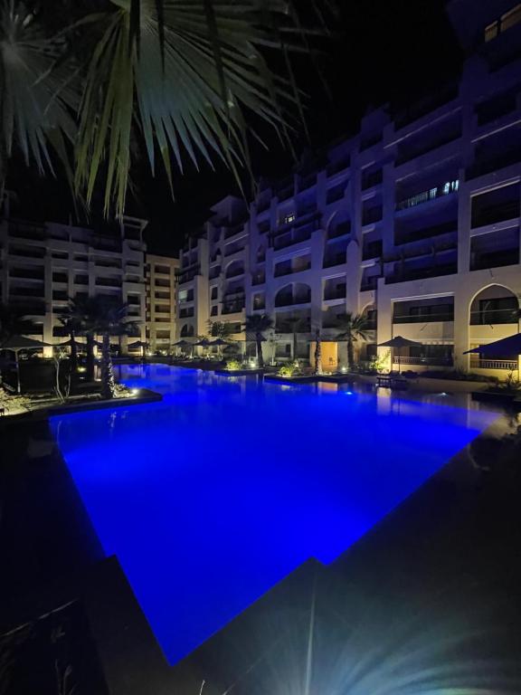 The swimming pool at or close to AlDau Heights Apartments