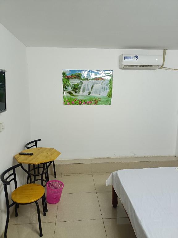 Rúm í herbergi á Good Luck Hostel