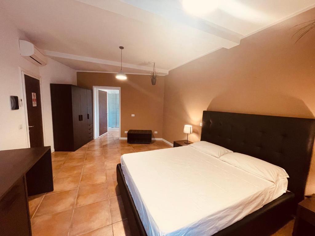 Postel nebo postele na pokoji v ubytování Conti B&B Suite Ponte Amato