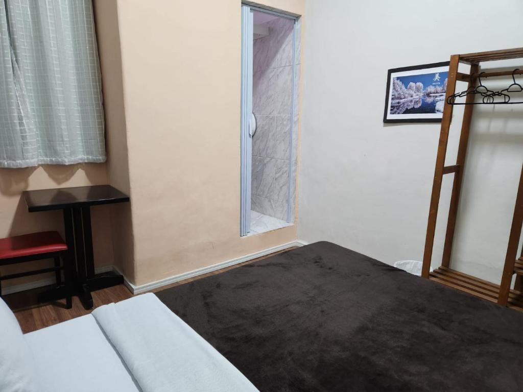 Postel nebo postele na pokoji v ubytování Fujima Hostel