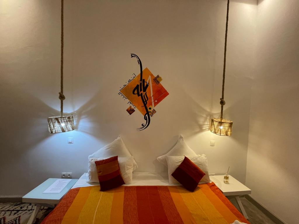 Postel nebo postele na pokoji v ubytování Riad Samarine