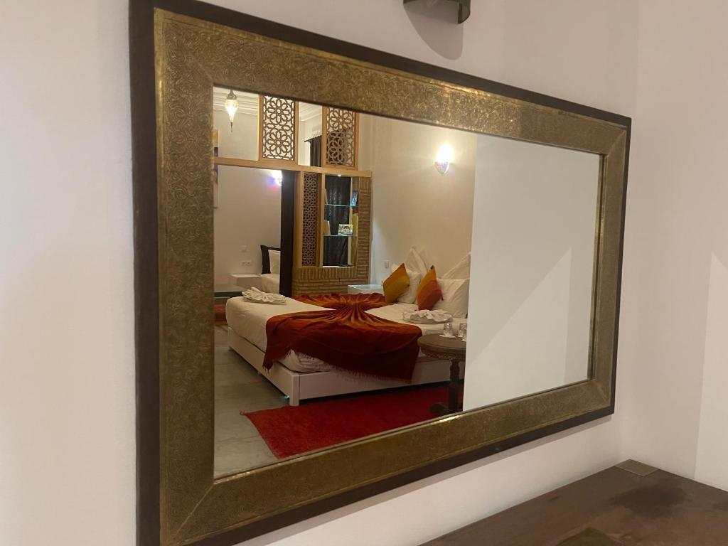 Postel nebo postele na pokoji v ubytování Riad Samarine