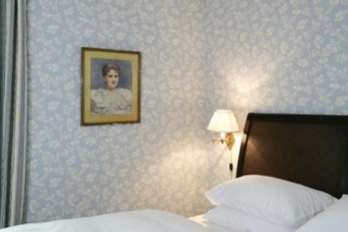 Postel nebo postele na pokoji v ubytování Hotel Frederiksminde